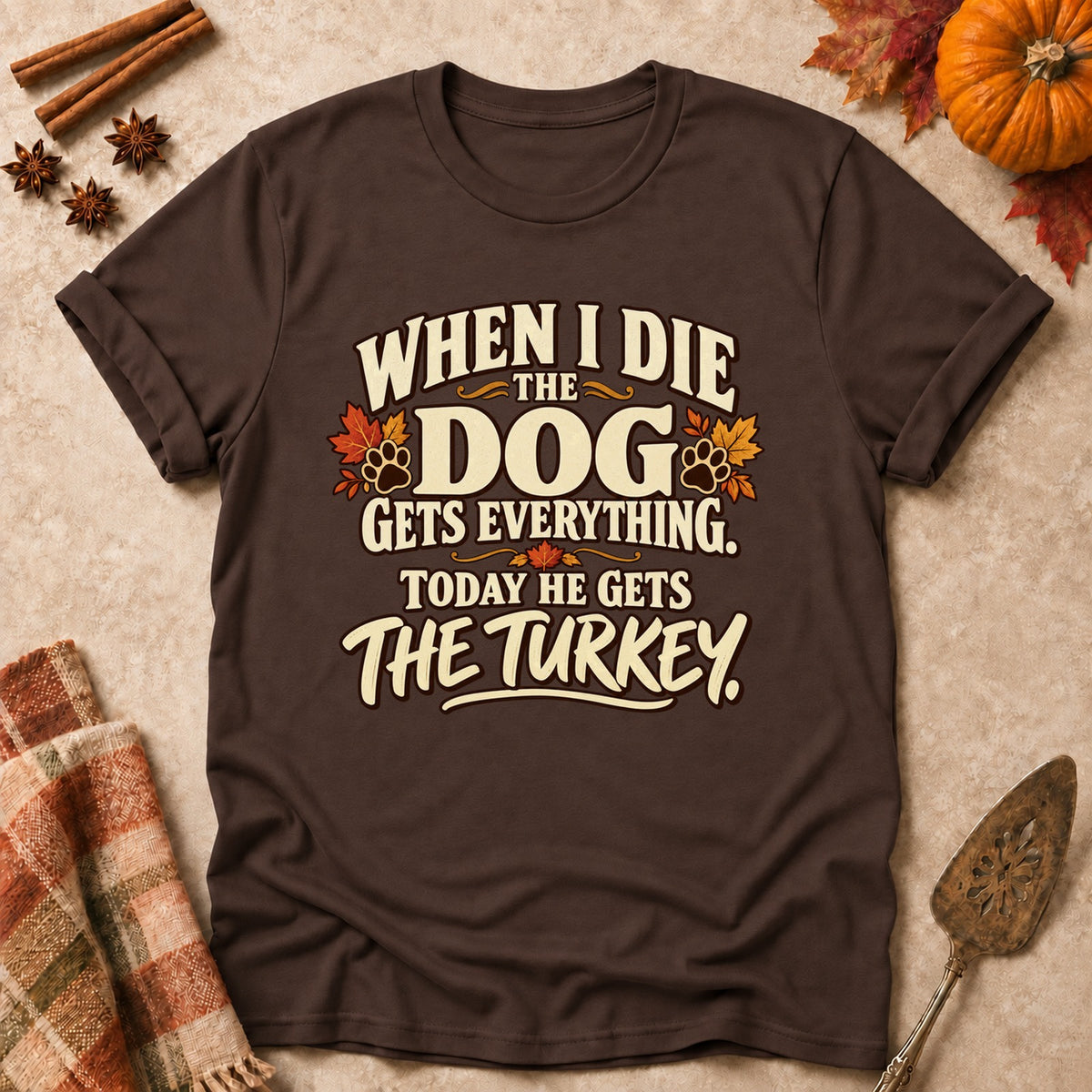 The Dog Gets Everything dog mom T-shirt in Dark Chocolate, laid flat. [bb c=dark-chocolate r=flat]