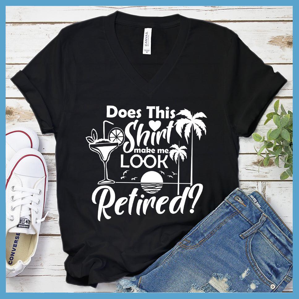 Does This Shirt Make Me Look Retired? Version 2 V-neck Black - Humorous 'Does This Shirt Make Me Look Retired?' text with palm tree and cocktail graphics on V-neck tee.