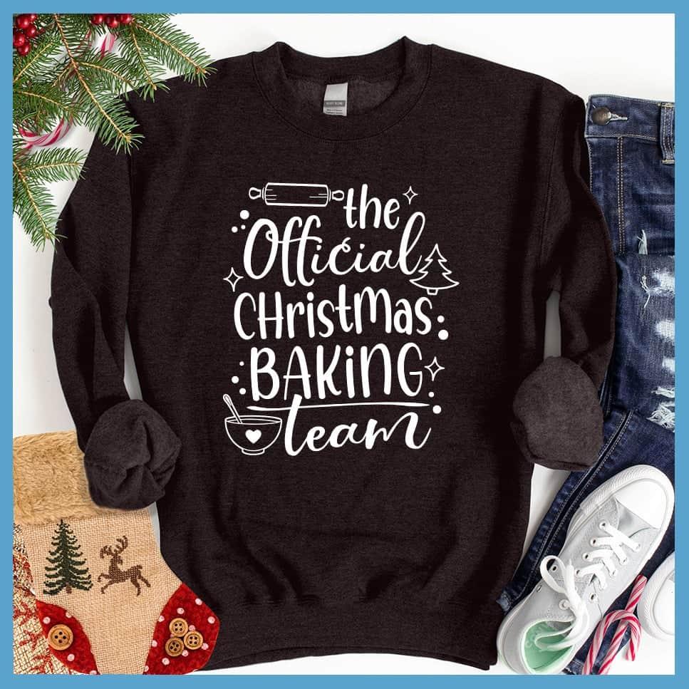 The Official Christmas Baking Team Sweatshirt Black - Cozy holiday sweatshirt with Christmas Baking Team design, perfect for festive cooking activities.