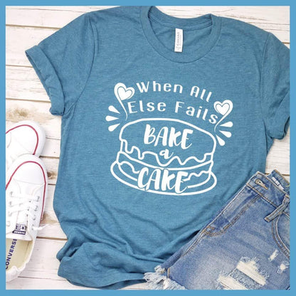 When All Else Fails Bake A Cake T-Shirt Heather Deep Teal - Casual baking-themed t-shirt with whimsical cake design and uplifting phrase.