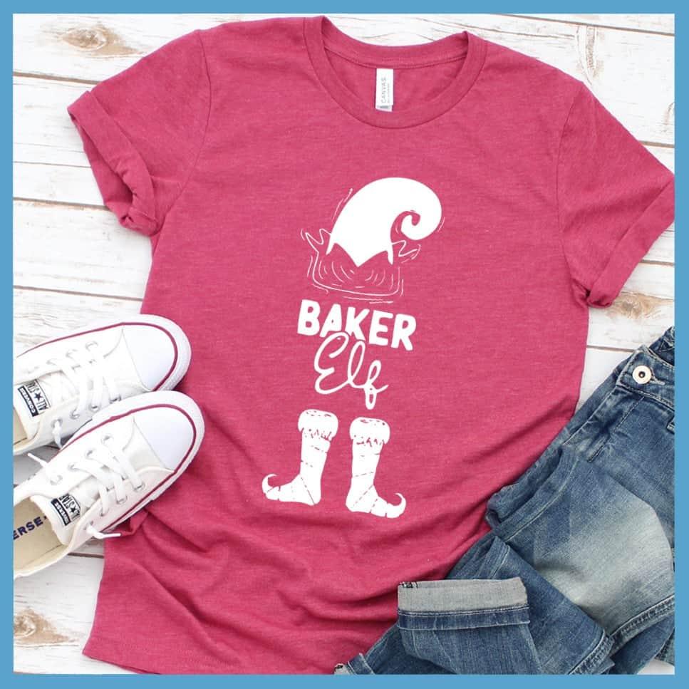 Baker Elf T-Shirt Heather Raspberry - Playful Baker Elf graphic t-shirt with festive holiday design for culinary fun