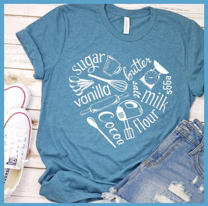 Bakery Heart Version 2 T-Shirt Heather Deep Teal - Whimsical baking-themed graphic tee with heart-shaped design of kitchen utensils and ingredients.
