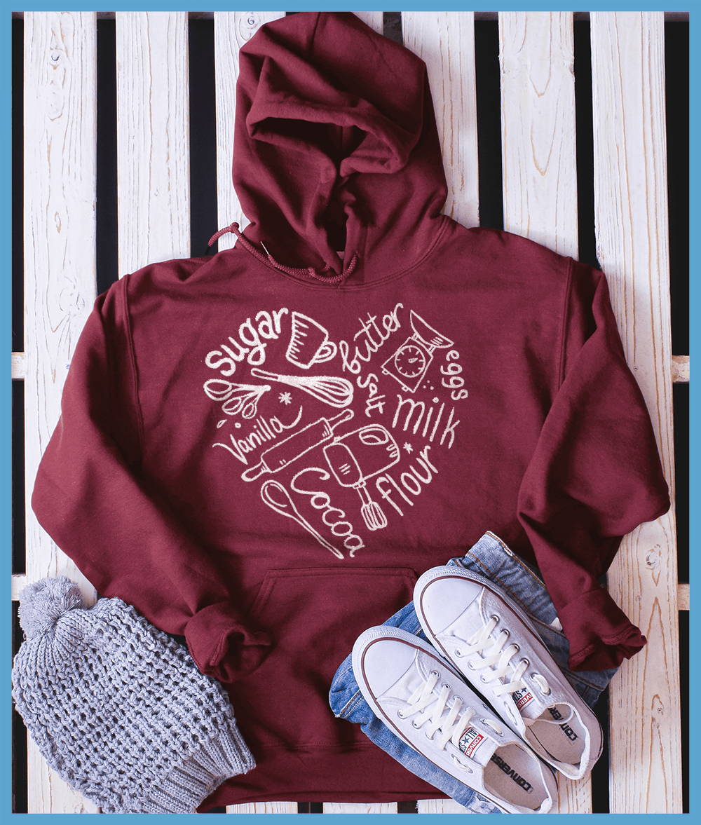 Bakery Heart Hoodie Crimson Heather - Cozy bakery-themed hoodie with playful ingredient design, perfect for casual or home wear.