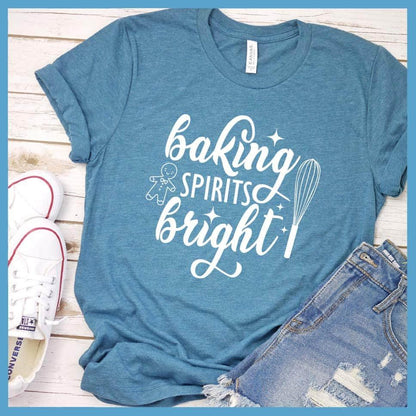 Baking Spirits Bright T-Shirt Heather Deep Teal - Illustrated 'Baking Spirits Bright' text with festive kitchen utensils design on tee