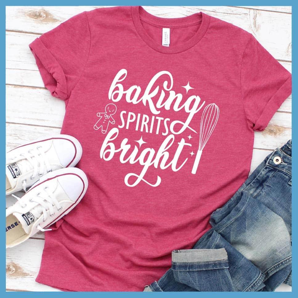 Baking Spirits Bright T-Shirt Heather Raspberry - Illustrated 'Baking Spirits Bright' text with festive kitchen utensils design on tee