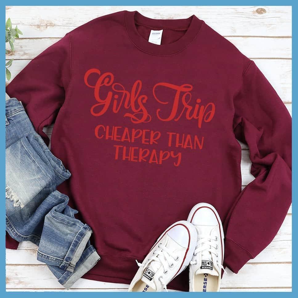 Girls Trip Colored Print Christmas Version Sweatshirt Crimson - Holiday-themed sweatshirt with "Girls Trip" and "Cheaper Than Therapy" humorous print.