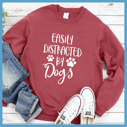 Easily Distracted By Dogs Sweatshirt Crimson - Fun and cozy 'Easily Distracted By Dogs' sweatshirt with playful paw prints design.