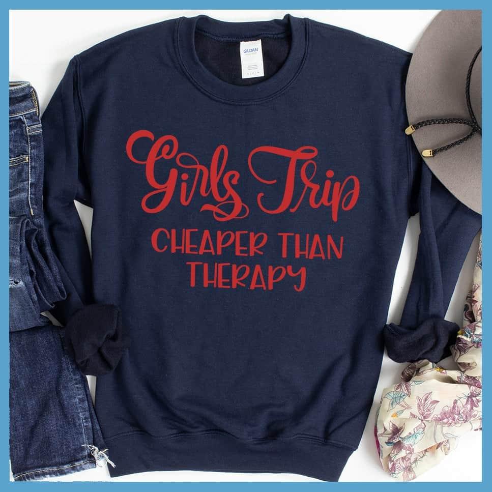 Girls Trip Colored Print Christmas Version Sweatshirt Navy - Holiday-themed sweatshirt with "Girls Trip" and "Cheaper Than Therapy" humorous print.