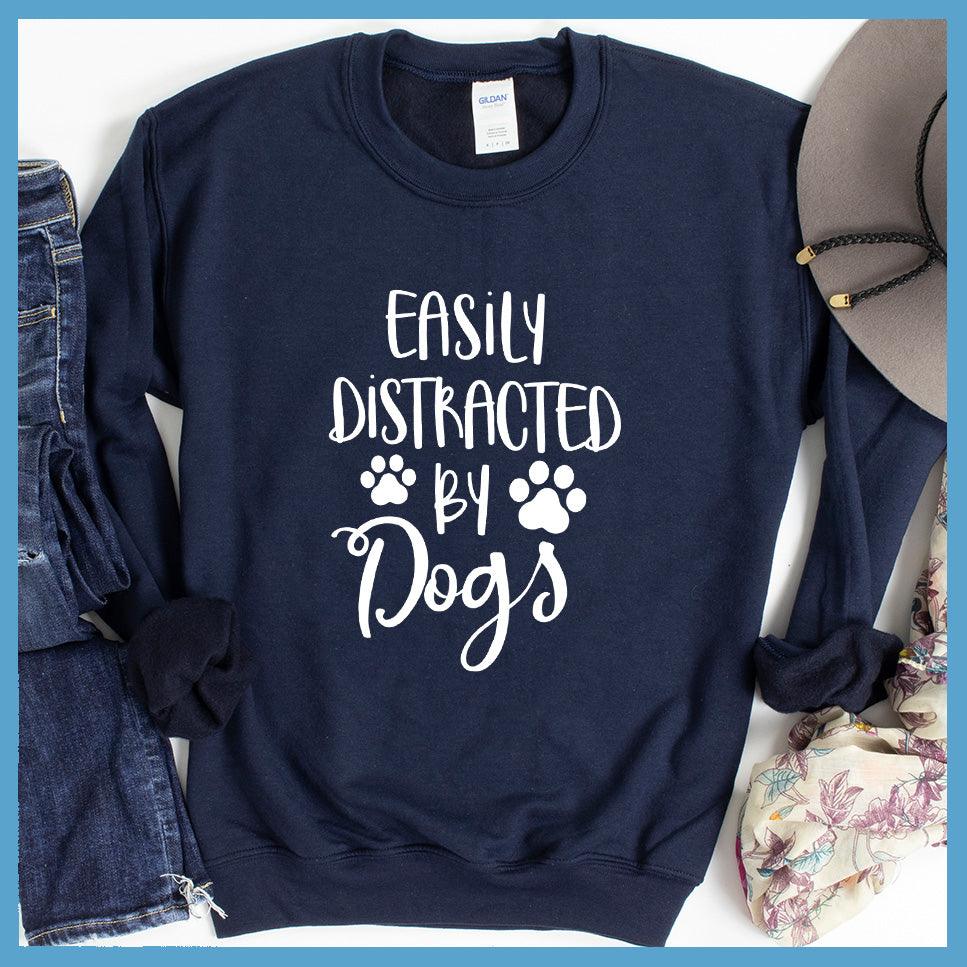 Easily Distracted By Dogs Sweatshirt Navy - Fun and cozy 'Easily Distracted By Dogs' sweatshirt with playful paw prints design.