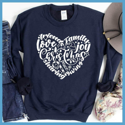 Christmas Heart Sweatshirt Navy - Holiday-themed graphic sweatshirt with Christmas and joyful expressions in heart design.