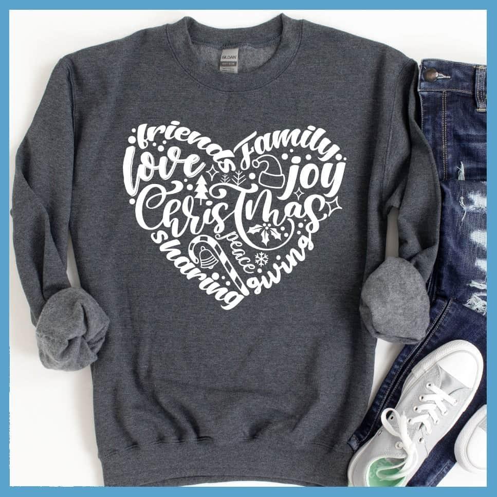 Christmas Heart Sweatshirt Nickel - Holiday-themed graphic sweatshirt with Christmas and joyful expressions in heart design.