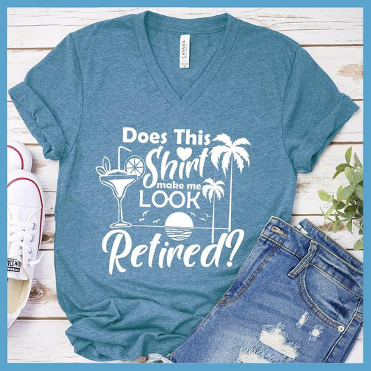 Does This Shirt Make Me Look Retired? Version 2 V-neck Heather Deep Teal - Humorous 'Does This Shirt Make Me Look Retired?' text with palm tree and cocktail graphics on V-neck tee.