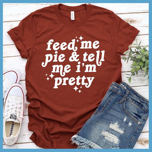 Feed Me Pie & Tell Me I’m Pretty T-Shirt Rust - Cheeky phrase design on trendy casual T-shirt, perfect for adding a dash of humor to everyday style.