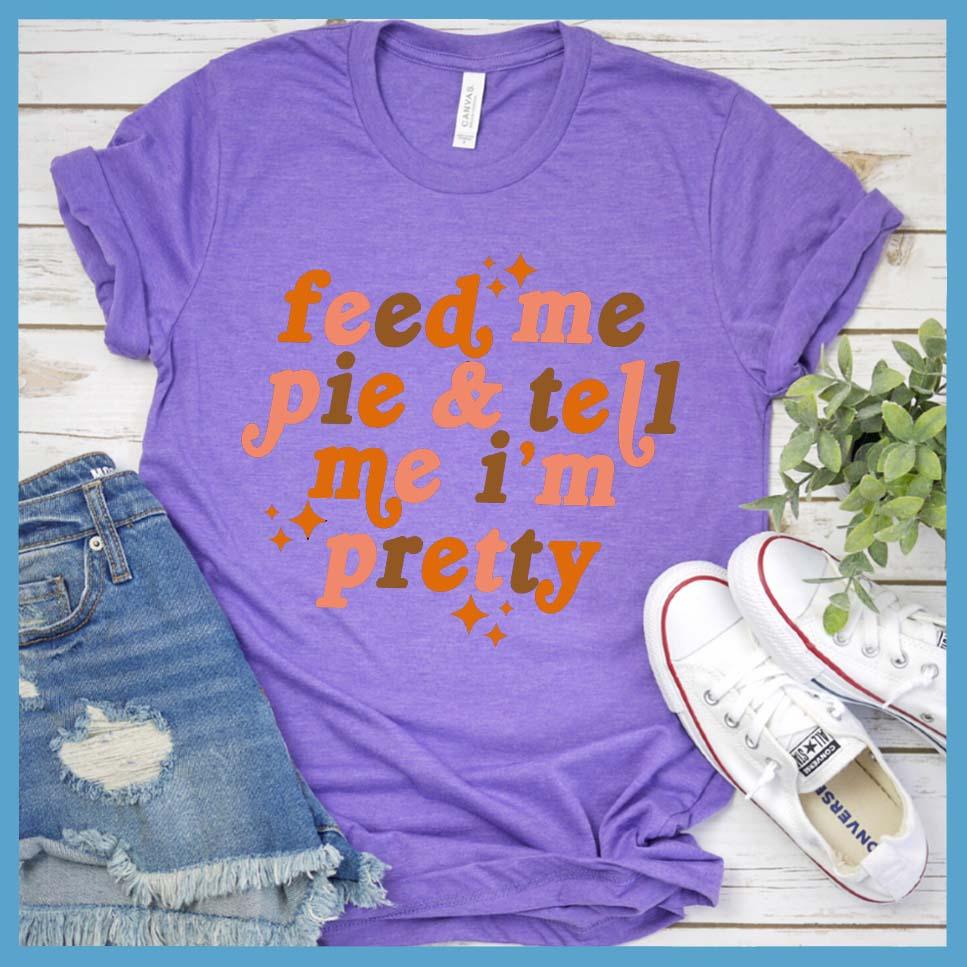 Feed Me Pie & Tell Me I’m Pretty Colored T-Shirt Heather Purple - Graphic t-shirt with "Feed Me Pie & Tell Me I’m Pretty" text, perfect for casual chic styling.