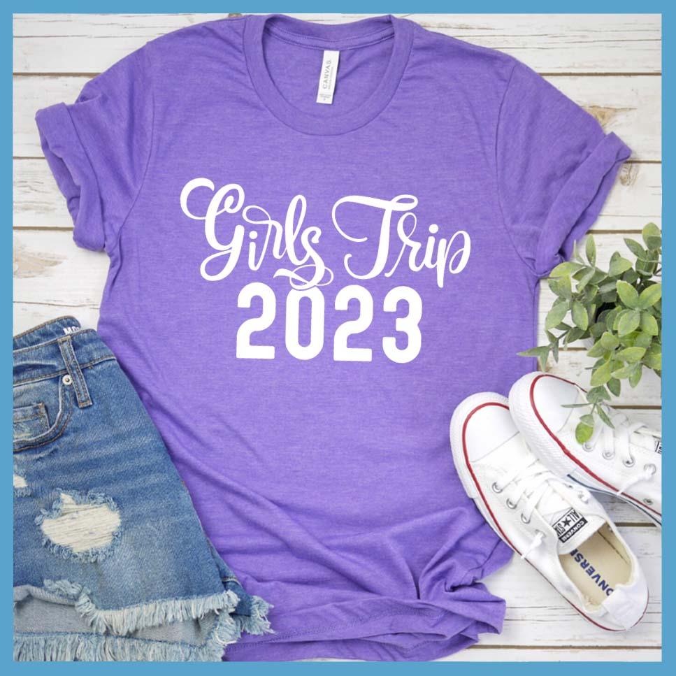Girls Trip 2023 T-Shirt Heather Purple - Graphic tee with 'Girls Trip 2023' text, ideal for group travel and friendship.