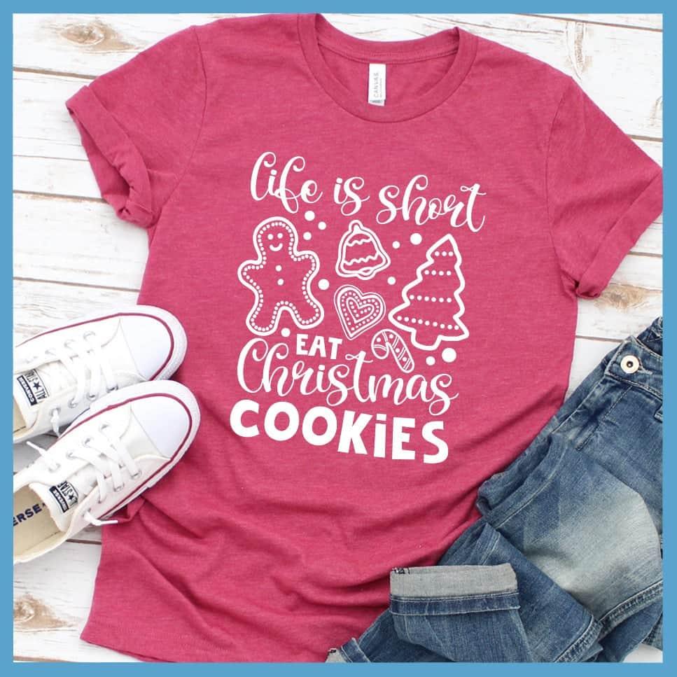 Life Is Short Eat Christmas Cookies T-Shirt Heather Raspberry - Festive tee with 'Life Is Short Eat Christmas Cookies' message and cute seasonal cookie designs.