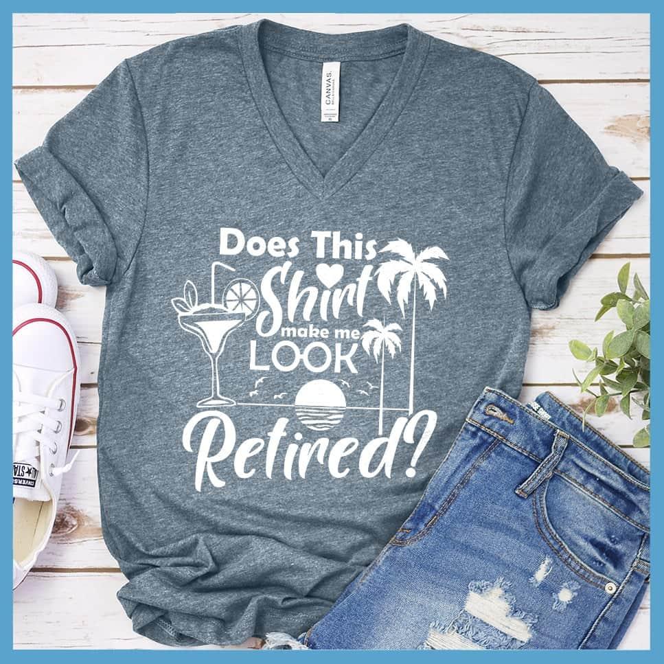 Does This Shirt Make Me Look Retired? Version 2 V-neck Heather Slate - Humorous 'Does This Shirt Make Me Look Retired?' text with palm tree and cocktail graphics on V-neck tee.