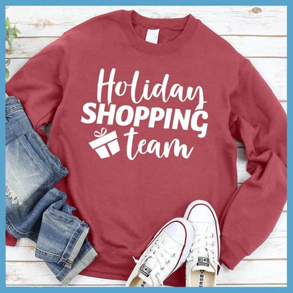 Holiday Shopping Team Sweatshirt Crimson - Festive holiday-themed sweatshirt with cheerful 'Holiday Shopping Team' design