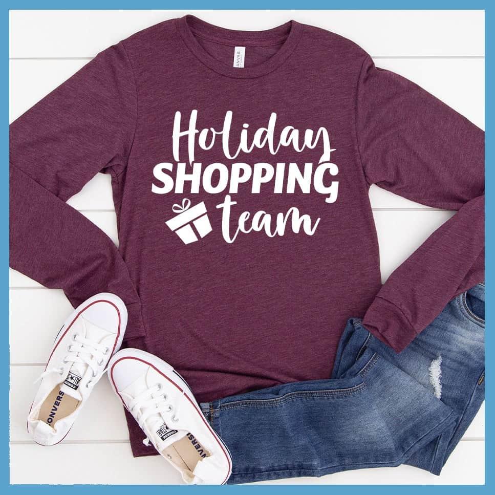Holiday Shopping Team Long Sleeves Maroon Triblend - Casual long sleeve top with a 'Holiday Shopping Team' slogan for cheerful style
