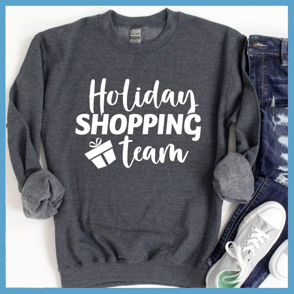 Holiday Shopping Team Sweatshirt Nickel - Festive holiday-themed sweatshirt with cheerful 'Holiday Shopping Team' design