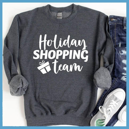 Holiday Shopping Team Sweatshirt Nickel - Festive holiday-themed sweatshirt with cheerful 'Holiday Shopping Team' design