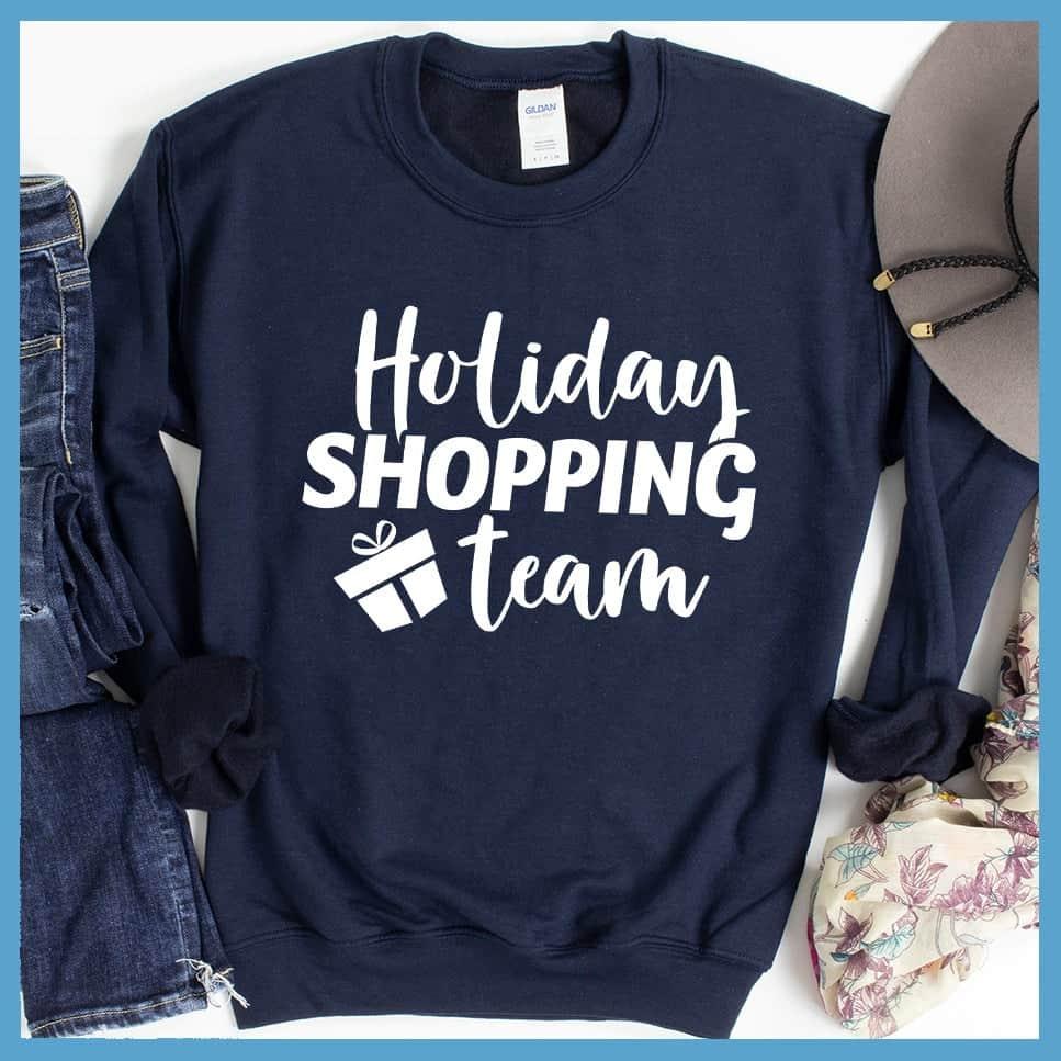Holiday Shopping Team Sweatshirt Navy - Festive holiday-themed sweatshirt with cheerful 'Holiday Shopping Team' design