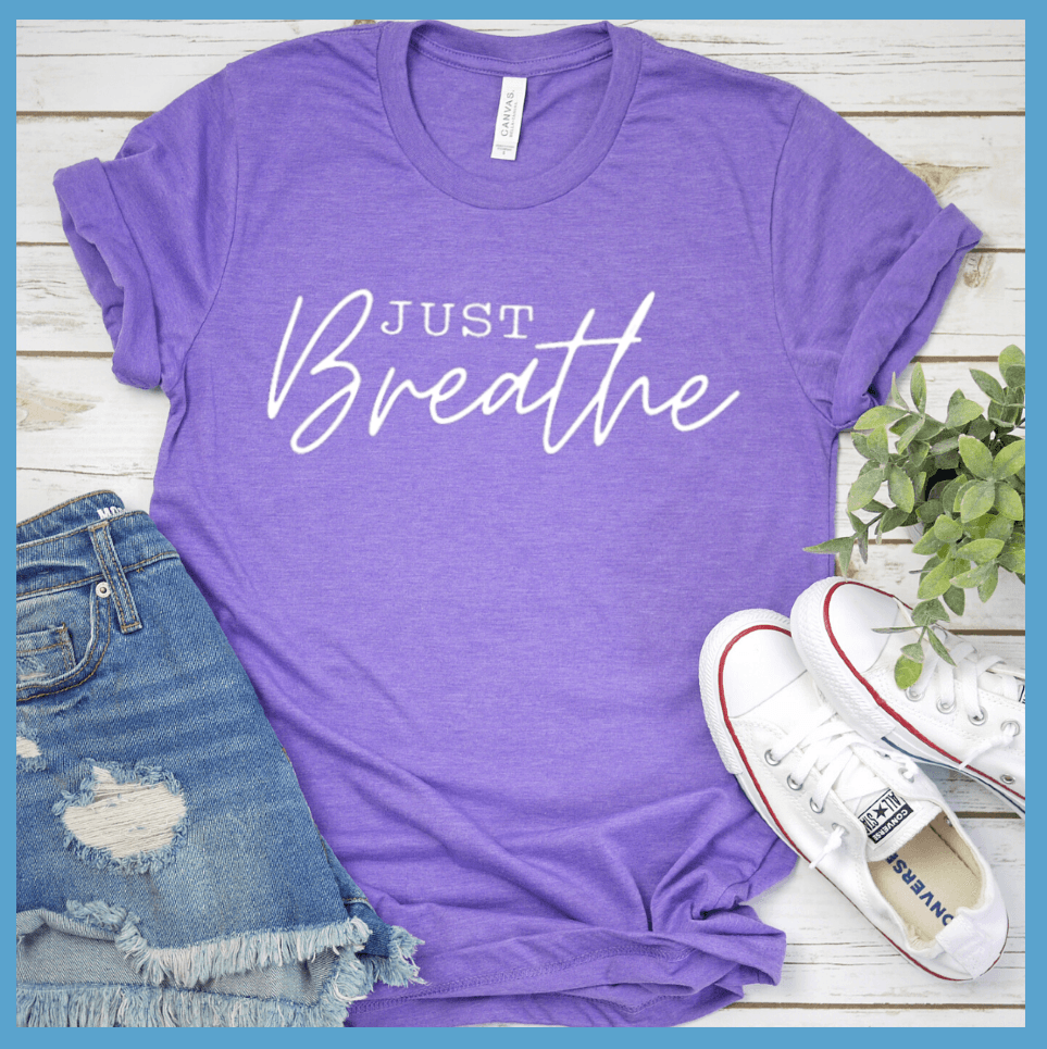 Just Breathe T-Shirt Heather Purple - Elegant Just Breathe script on a stylish, crew neck t-shirt for mindful expression.
