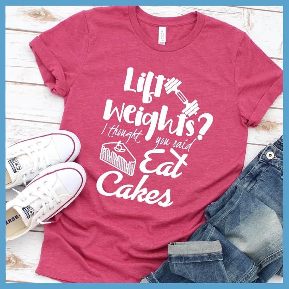 Lift Weights I Thought You Said Eat Cakes T-Shirt Heather Raspberry - Humorous unisex 'Lift Weights I Thought You Said Eat Cakes' graphic tee with playful gym-and-dessert design.