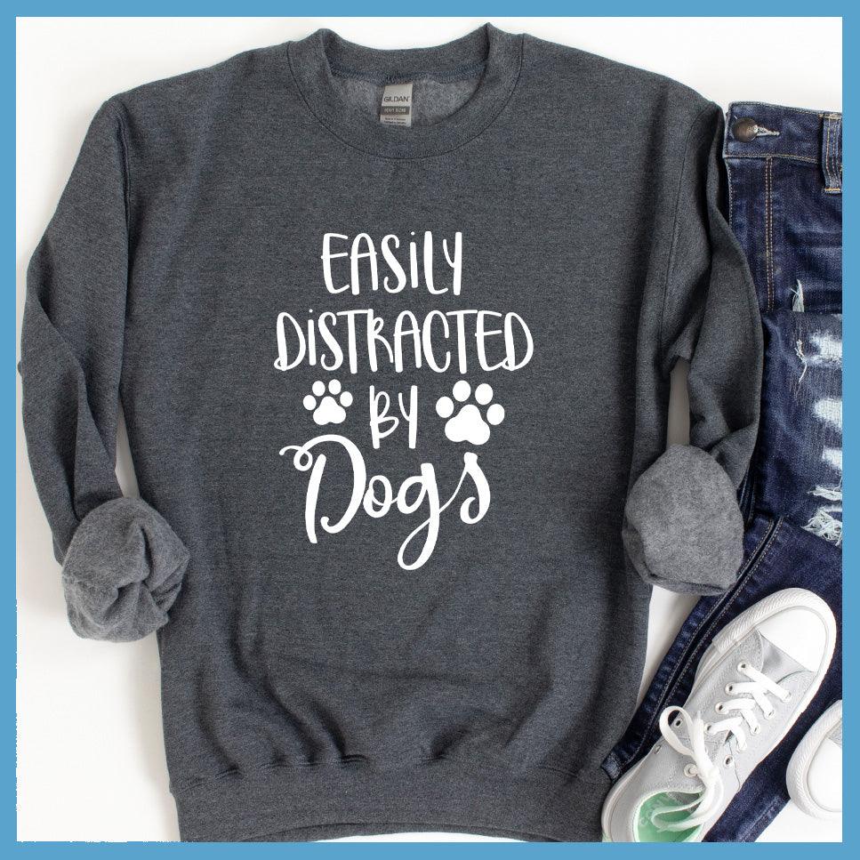Easily Distracted By Dogs Sweatshirt Nickel - Fun and cozy 'Easily Distracted By Dogs' sweatshirt with playful paw prints design.