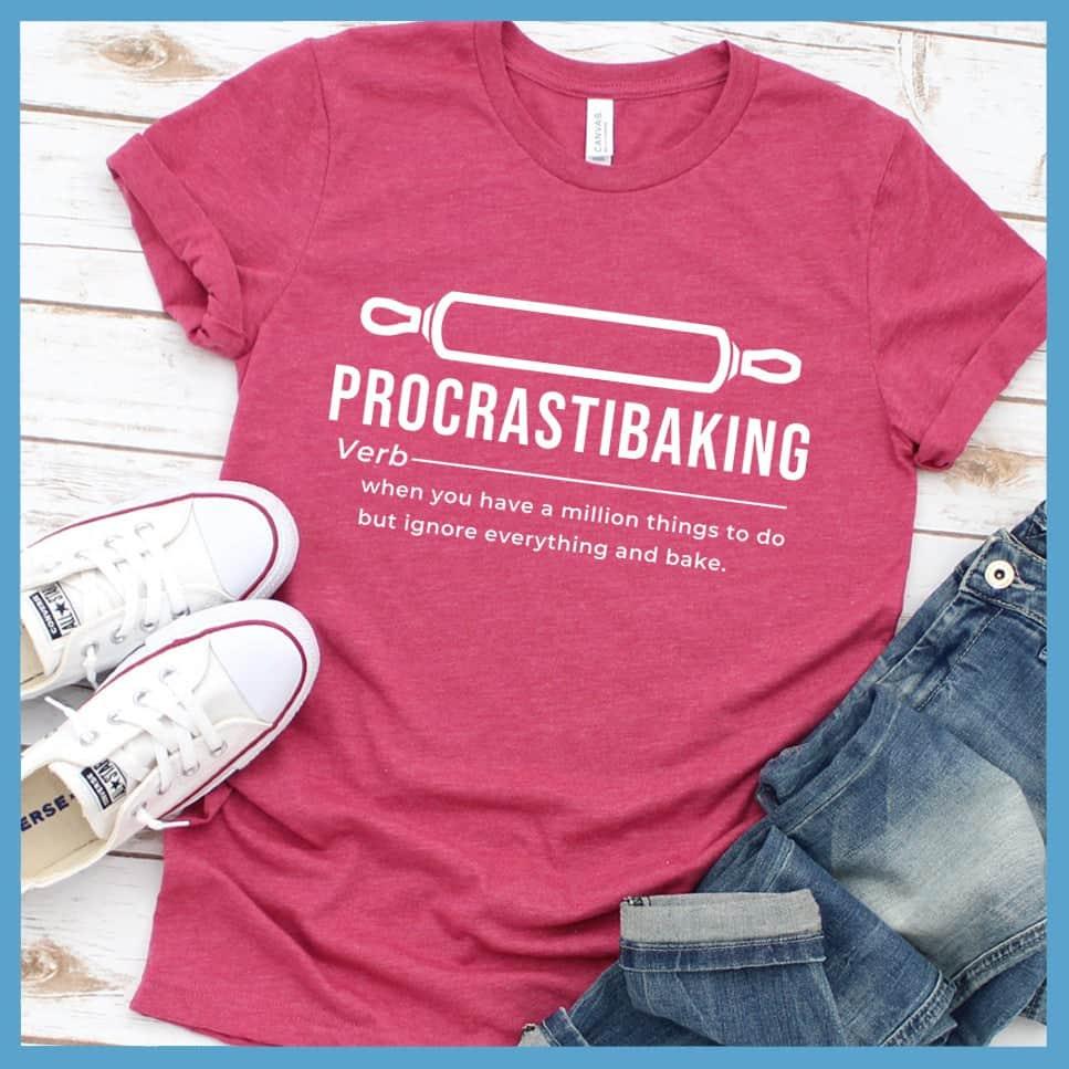 Procrastibaking T-Shirt Heather Raspberry - Witty Procrastibaking T-Shirt with humorous baking definition design, perfect for casual fashion and baking fans.