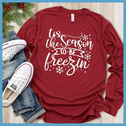 Tis The Season To Be Freezin Long Sleeves Red - Long sleeve winter shirt with whimsical snowflake design and festive phrase.