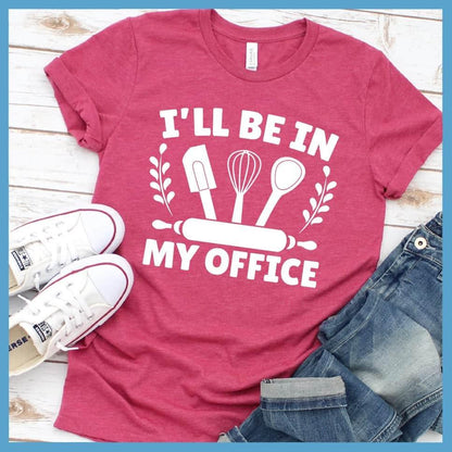 I'll Be In My Office - Baking T-Shirt Heather Raspberry - Graphic t-shirt with 'I'll Be In My Office - Baking' text and kitchen utensils design.