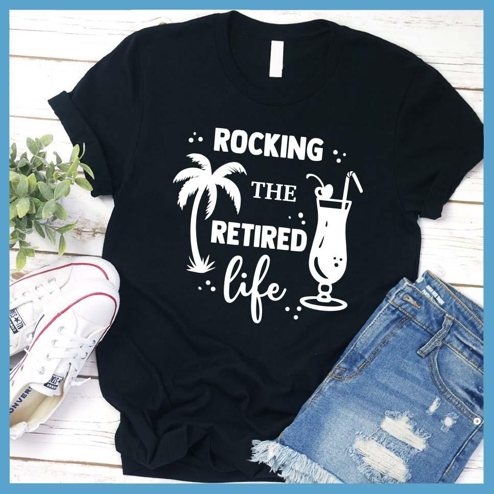 Rocking The Retired Life T-Shirt Black - Retirement-themed t-shirt with palm tree and drink design celebrating the leisure life.