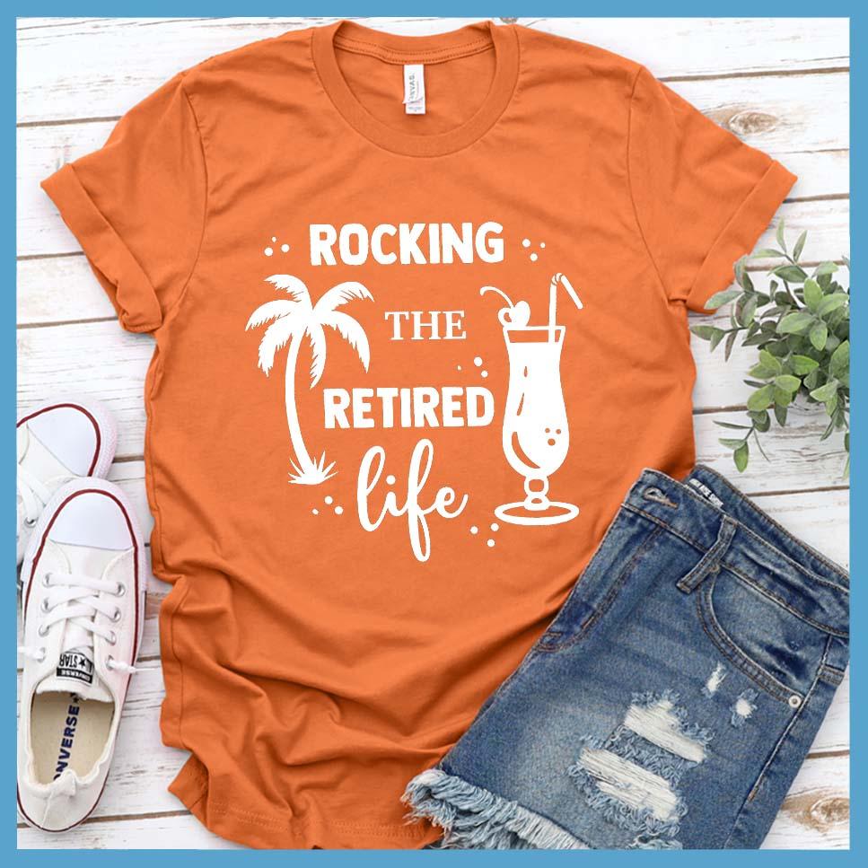 Rocking The Retired Life T-Shirt Burnt Orange - Retirement-themed t-shirt with palm tree and drink design celebrating the leisure life.