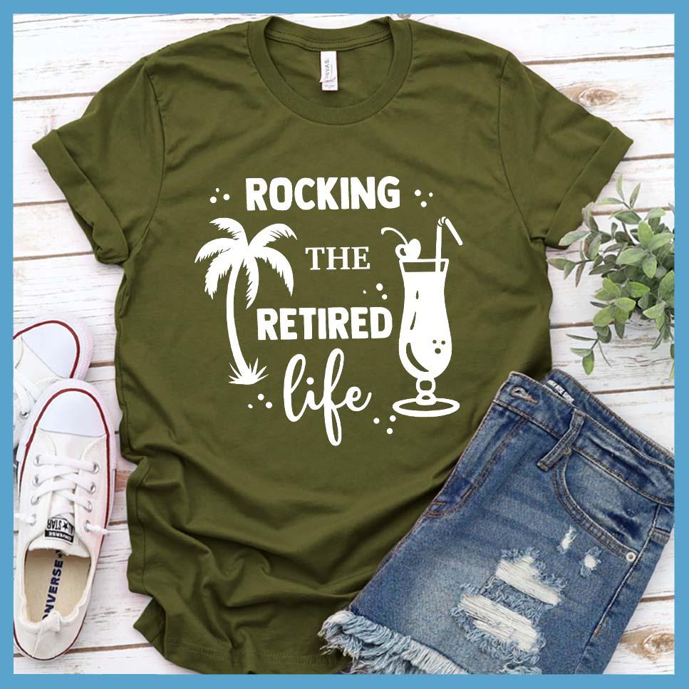 Rocking The Retired Life T-Shirt Olive - Retirement-themed t-shirt with palm tree and drink design celebrating the leisure life.