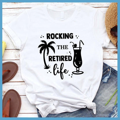 Rocking The Retired Life T-Shirt White - Retirement-themed t-shirt with palm tree and drink design celebrating the leisure life.