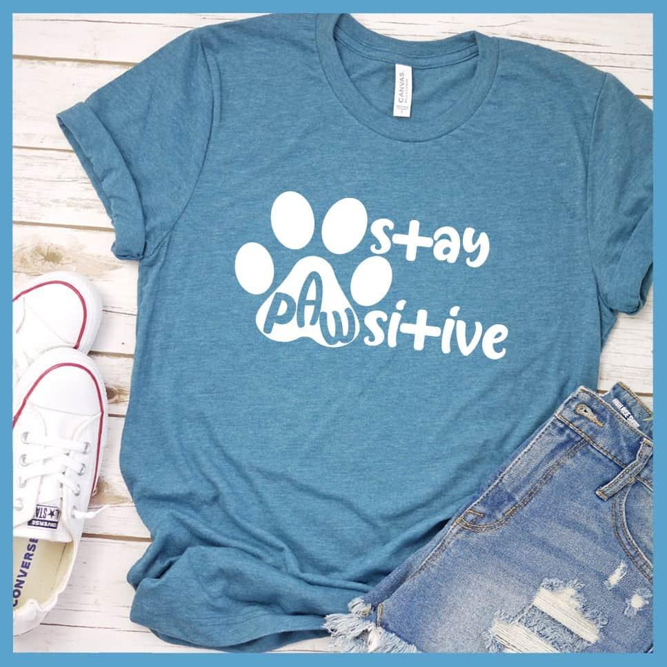 Stay Pawsitive T-Shirt Heather Deep Teal - Graphic tee with "Stay Pawsitive" message featuring a paw print design for pet lovers.