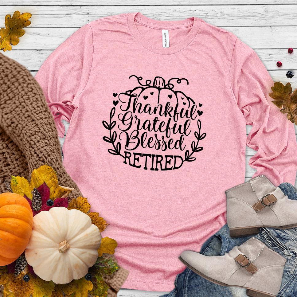Thankful Grateful Blessed Retired Long Sleeves Pink - "Thankful Grateful Blessed Retired" script on cozy long sleeve shirt for retirees.