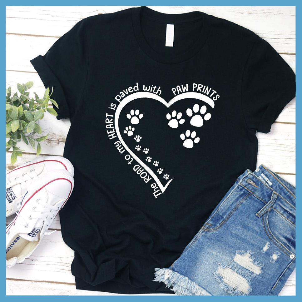 The Way To My Heart Is Paved With Paw Prints T-Shirt Black - Heart and paw print design on casual T-shirt symbolizing love for pets.