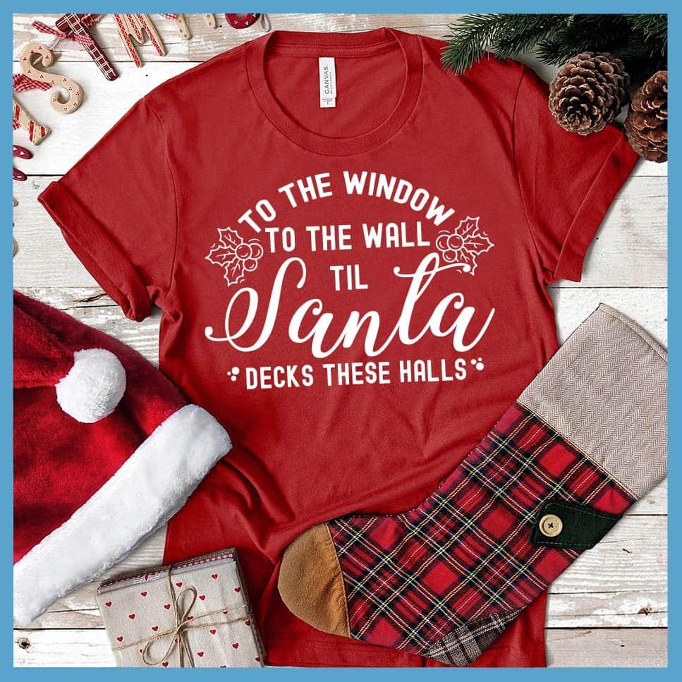 To The Window To the Wall Till Santa Decks These Halls T-Shirt Canvas Red - Holiday spirit t-shirt with fun Santa-themed graphic design perfect for Christmas celebrations.