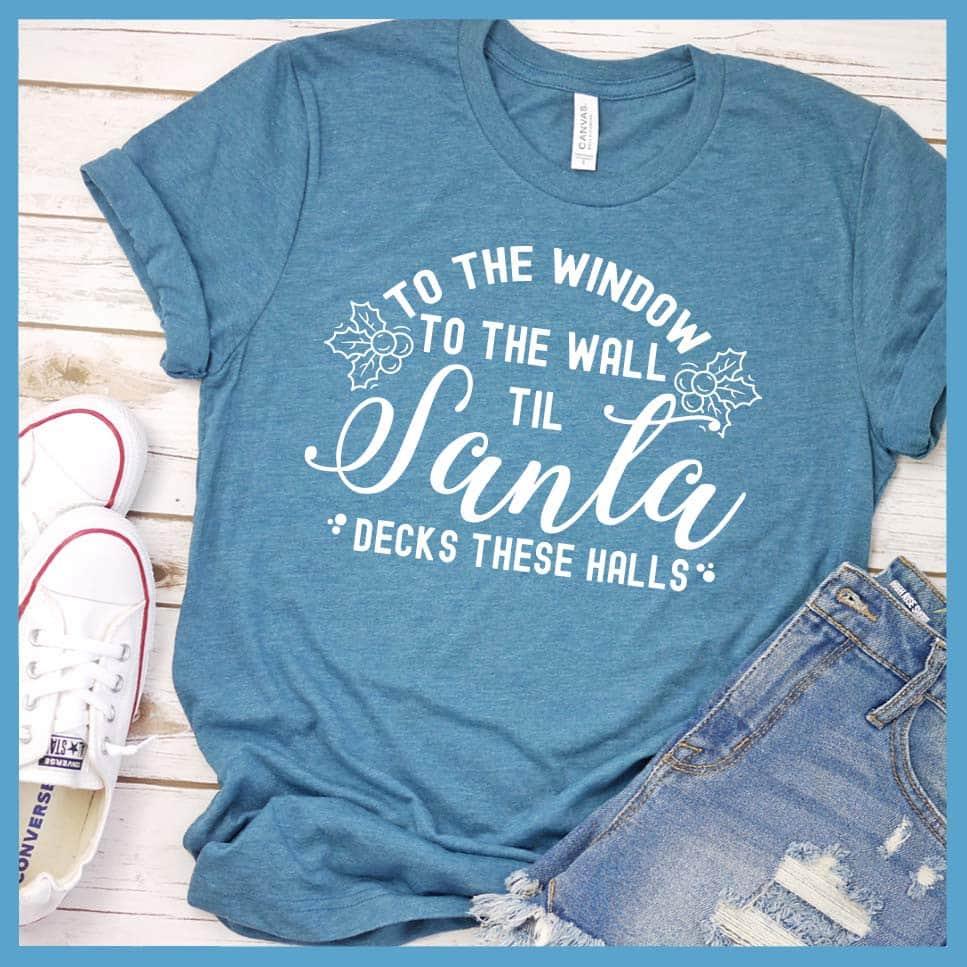 To The Window To the Wall Till Santa Decks These Halls T-Shirt Heather Deep Teal - Holiday spirit t-shirt with fun Santa-themed graphic design perfect for Christmas celebrations.