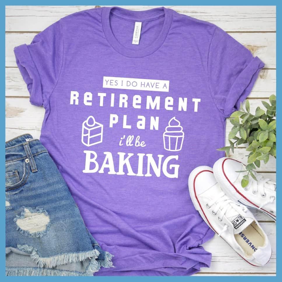 Yes I Do Have A Retirement Plan I'll Be Baking T-Shirt Heather Purple - Graphic tee with "Retirement Plan: I'll be Baking" text, perfect for baking enthusiasts.