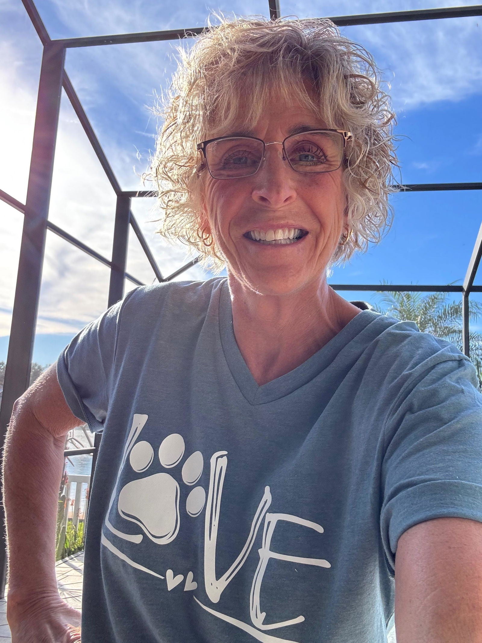 Customer wearing Brooke & Belle dog love shirt