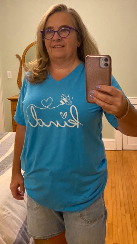 Customer in a Brooke & Belle Bee Kind shirt