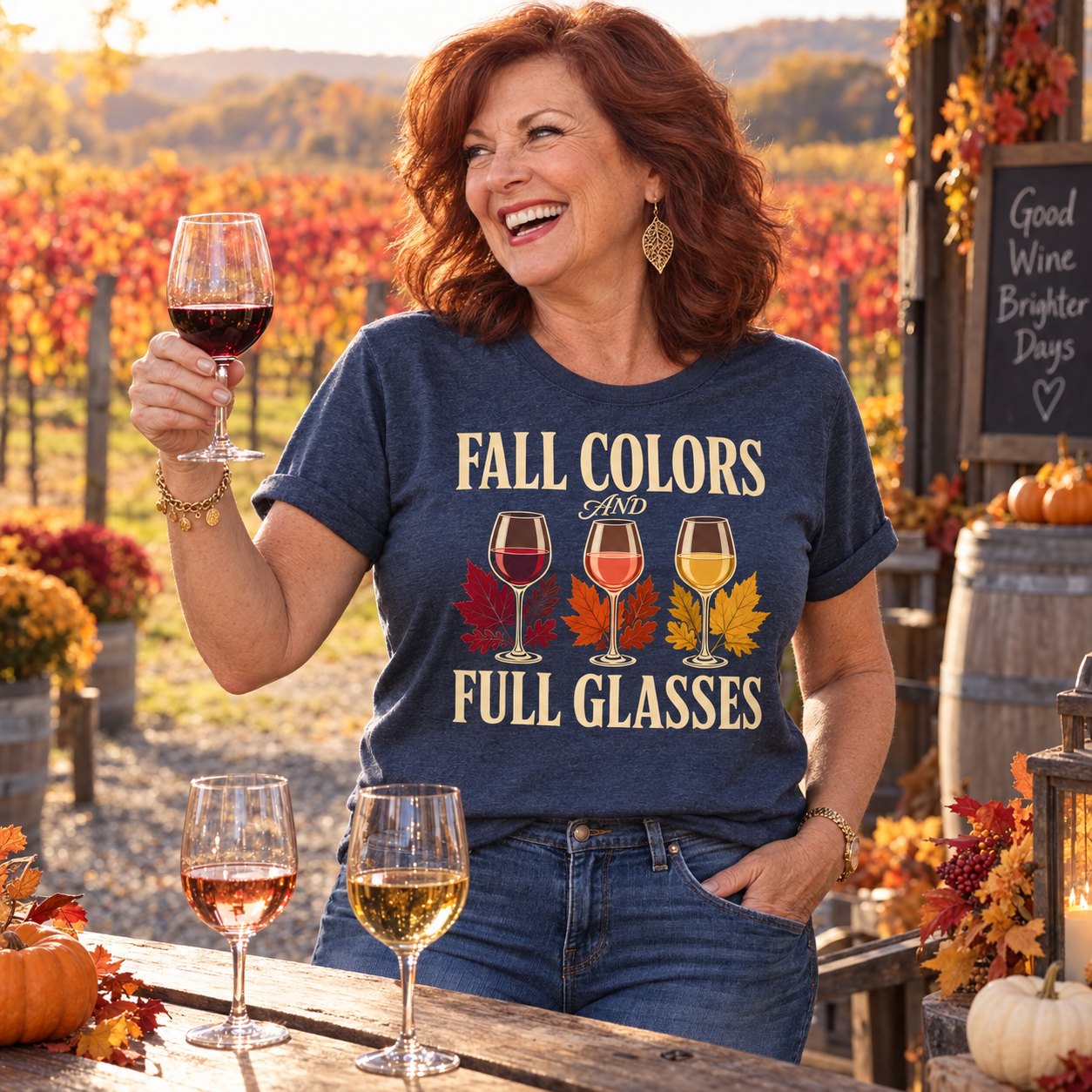 A woman raising a glass at a fall winery tasting bar in the Fall Colors shirt